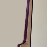 Black Compact Bass with Flame Maple and Purple Heart Neck.